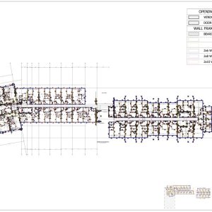 Architectural floor plan showing two main building sections connected by a corridor. Includes a legend for wall types and openings, and a small key plan for context in the bottom right corner.